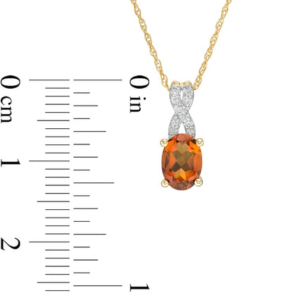 Oval Madeira Citrine and 0.05 CT. T.W. Natural Diamond "X" Drop Pendant in 10K Yellow Gold