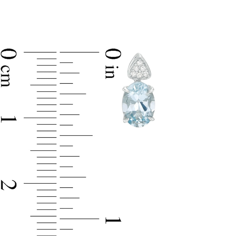 Oval Aquamarine and 0.05 CT. T.W. Triangular Composite Diamond Drop Earrings in 10K White Gold