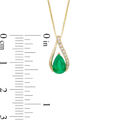 Pear-Shaped Emerald and 0.05 CT. T.W. Natural Diamond Teardrop Pendant in 10K Yellow Gold
