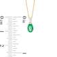 Oval Emerald and Baguette-Cut White Topaz Pendant in 10K Yellow Gold