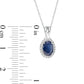 Oval Blue Sapphire and 0.07 CT. T.W. Natural Diamond Frame Pendant in 10K White Gold