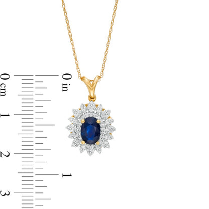 Oval Blue Sapphire and 0.2 CT. T.W. Natural Diamond Flower Frame Pendant in 10K Yellow Gold