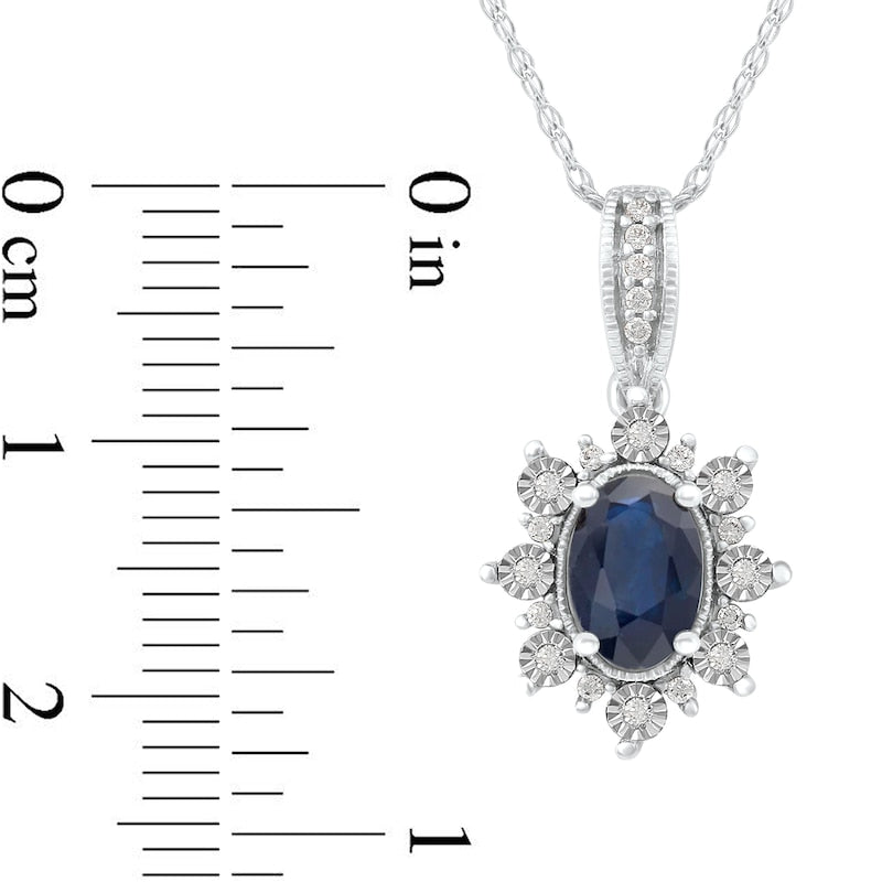 Oval Blue Sapphire and 0.07 CT. T.W. Natural Diamond Sunburst Frame Antique Vintage-Style Drop Pendant in 10K White Gold