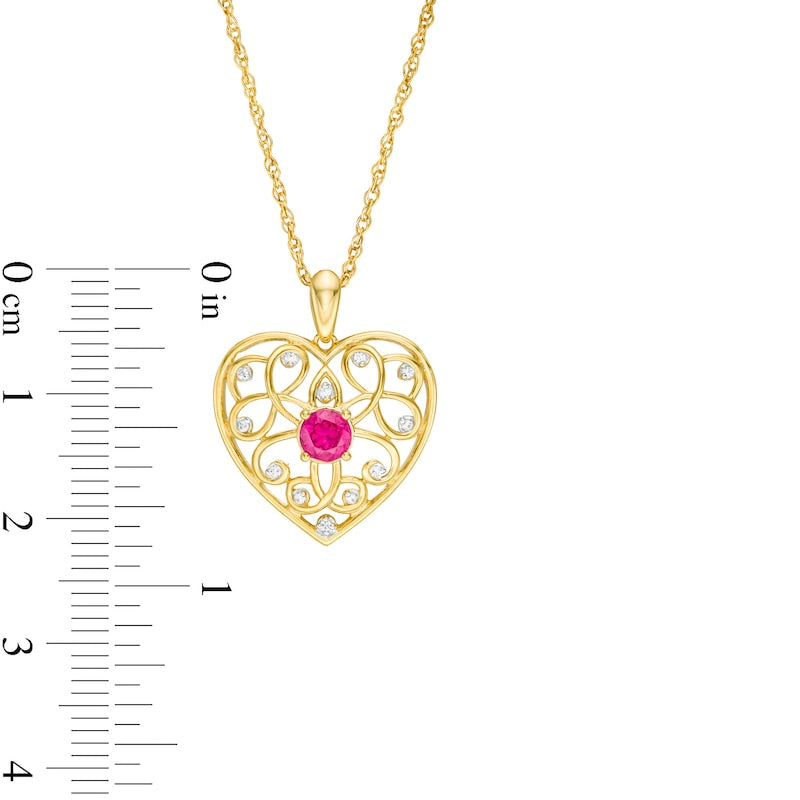 4.0mm Lab-Created Ruby and 0.05 CT. T.W. Diamond Filigree Heart Pendant in 10K Yellow Gold