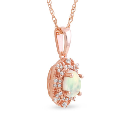 Oval Opal and 0.1 CT. T.W. Natural Diamond Bead Frame Sunburst Pendant in 10K Rose Gold