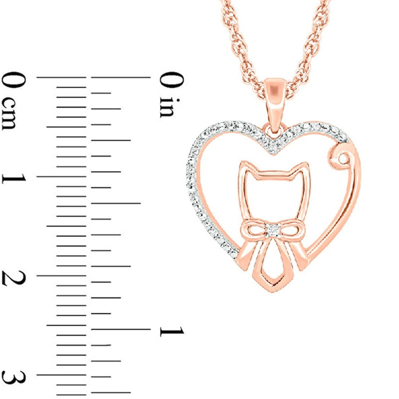 0.05 CT. T.W. Natural Diamond Cat with Bowtie in Heart Pendant in 10K Rose Gold