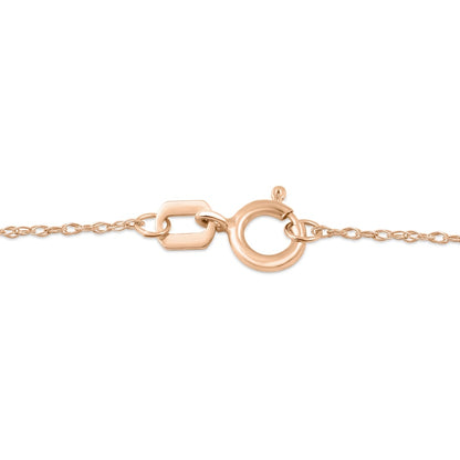 Oval Ruby and 0.05 CT. T.W. Baguette and Round Natural Diamond Stacked Top Accent Pendant in 10K Rose Gold
