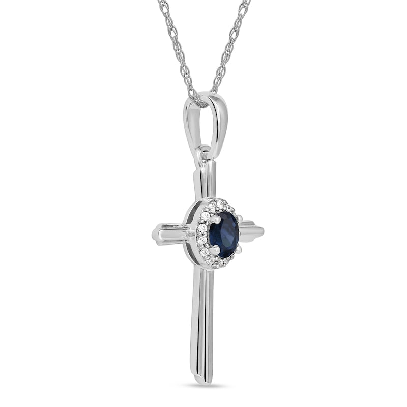 Oval Blue Sapphire and 0.05 CT. T.W. Natural Diamond Frame Layered Cross Pendant in 10K White Gold