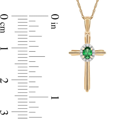 Oval Emerald and 0.05 CT. T.W. Natural Diamond Frame Layered Cross Pendant in 10K Yellow Gold