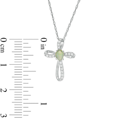Oval Opal and 0.1 CT. T.W. Natural Diamond Pinwheel Cross Pendant in 10K White Gold