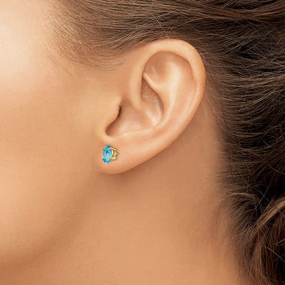 14k Yellow Gold 7x5mm Oval Blue Topaz Earrings