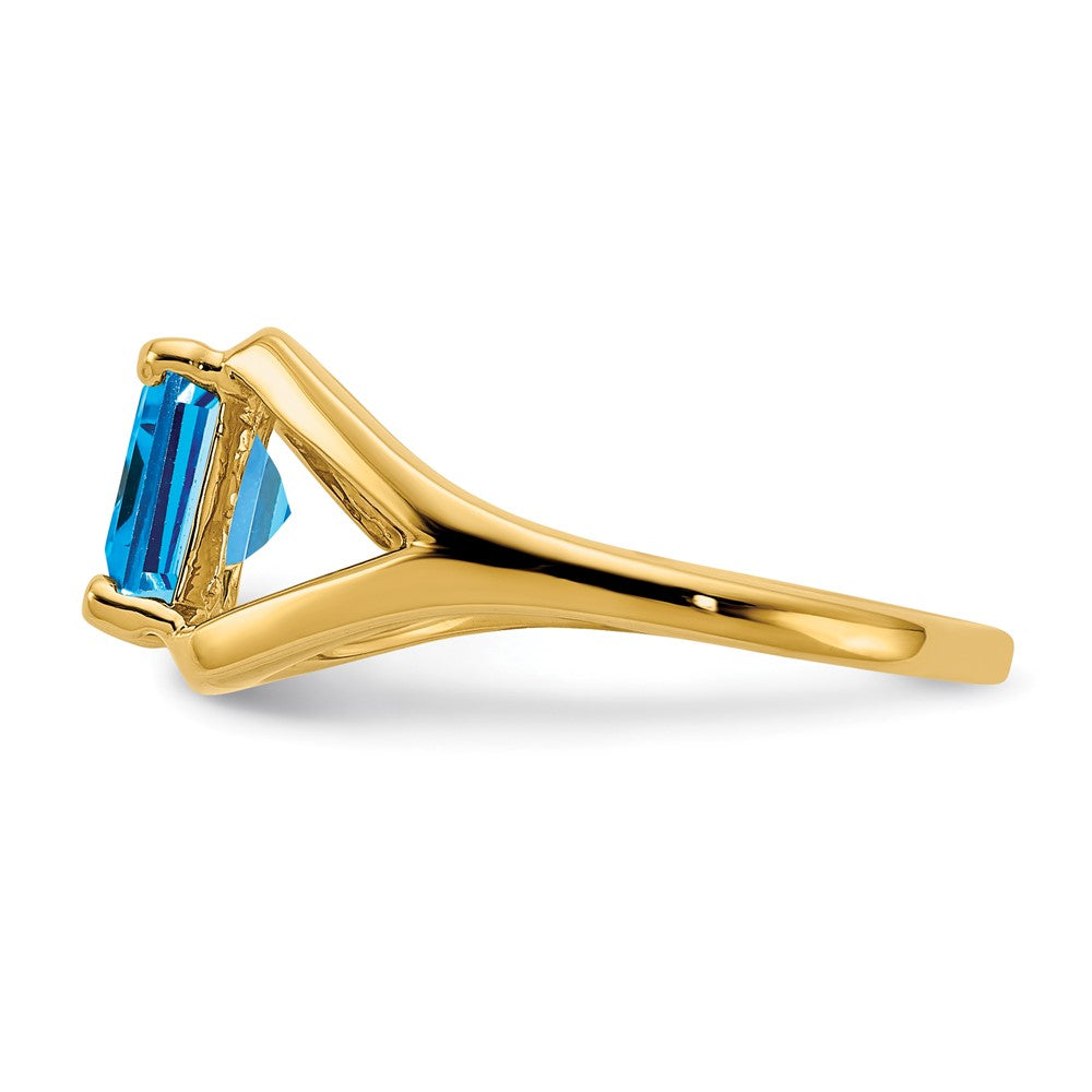 14K Yellow Gold 9x7mm Emerald Cut Blue Topaz ring