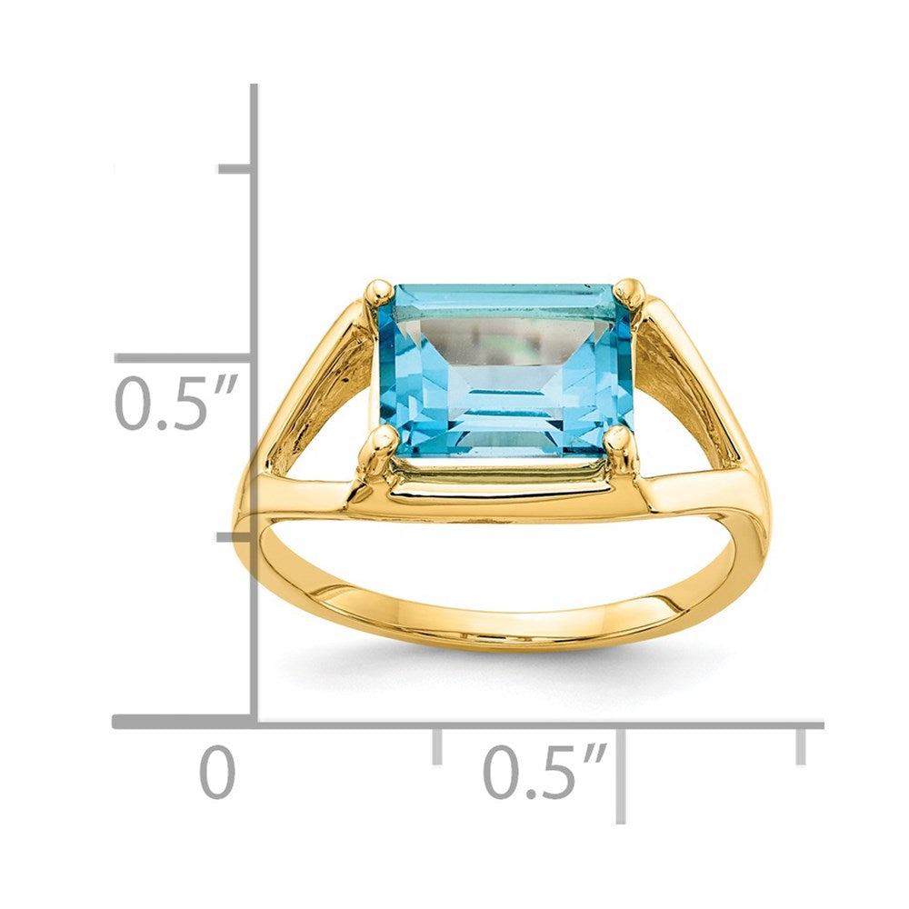 14K Yellow Gold 9x7mm Emerald Cut Blue Topaz ring
