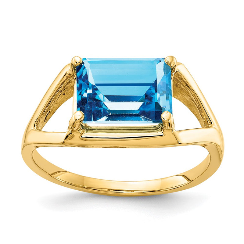 14K Yellow Gold 9x7mm Emerald Cut Blue Topaz ring