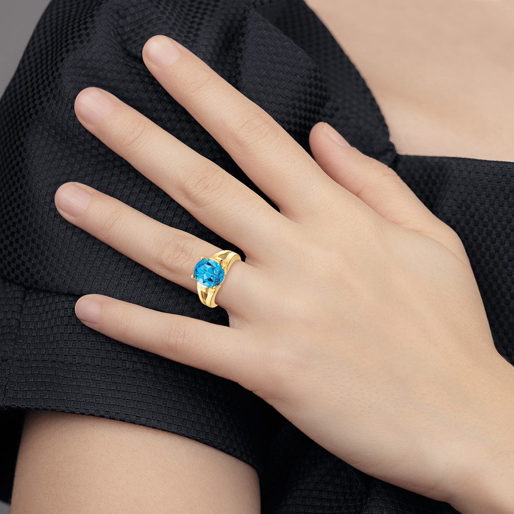 14K Yellow Gold 11x9mm Oval Blue Topaz ring