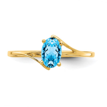 14K Yellow Gold 6x4mm Oval Blue Topaz ring