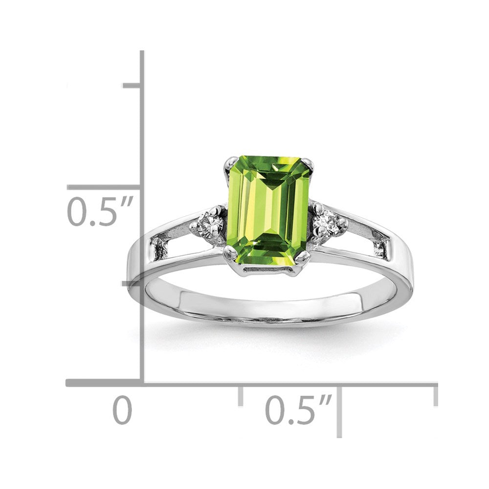 14k White Gold 7x5mm Emerald Cut Peridot A Diamond ring