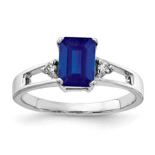 14k White Gold 7x5mm Emerald Cut Sapphire A Diamond ring