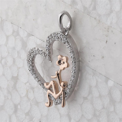 10k Two-tone Gold Round Diamond Heart Pendant 1/5 Cttw