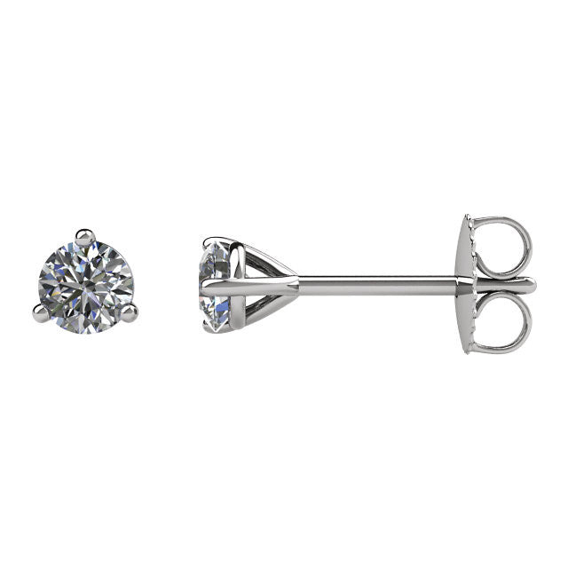 A matched pair of round-cut diamond stud earrings in 14kt white gold with friction post backings.